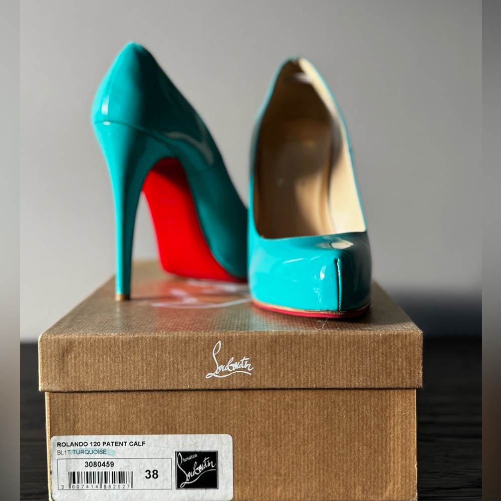 Size 8,
 Red Bottoms Rolando style, Turquoise shoes.